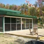 Horizontal sliding vinyl doors with aluminum framing