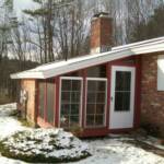 tennants side with 2 windows and storm door installed