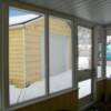 White aluminum framing with storm panels inside view